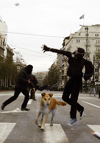 (9 january 2009)On a demostration about education cuts. Greece cannot afford money for education but must buy ships, planes, submarines and weaponry from our good - weapon manufacturing - allies, so that we have to borrow money from them and from the IMF in inconceivably high rates of interest..interesting isn’t it?.What Did You Learn In School?